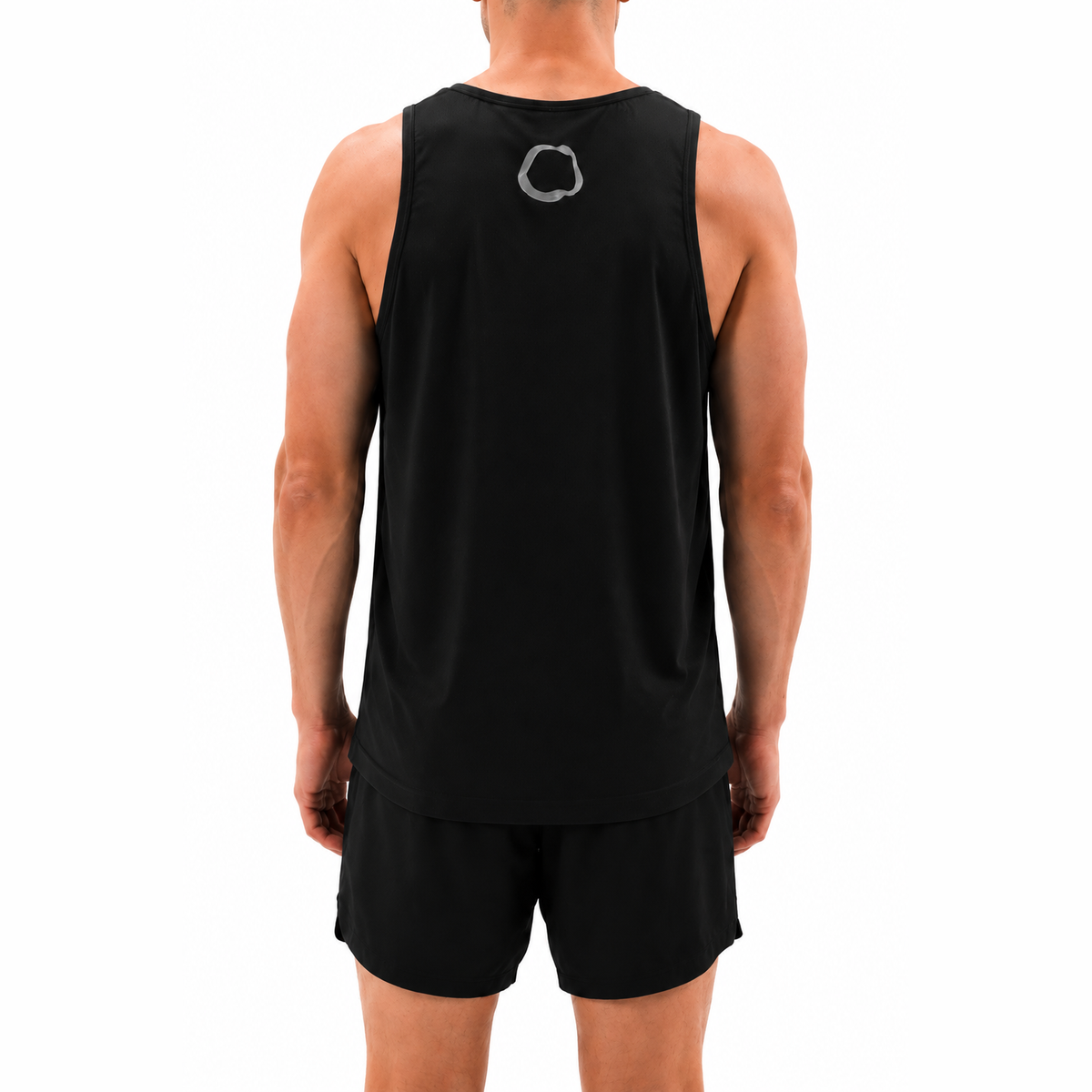 Model wearing the STASIS RD-1 running singlet in black, back view with STASIS orb logo below the collar